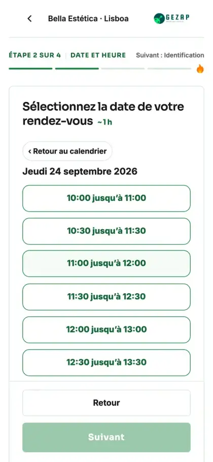 Téléphone affichant la page publique de prise de rendez-vous de l’établissement de Lisbonne, avec les créneaux horaires dans le fuseau de Lisbonne