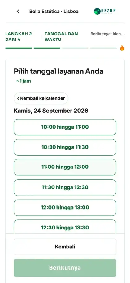 Ponsel dengan halaman publik untuk membuat janji temu di unit Lisboa, menampilkan waktu dalam zona waktu Lisboa